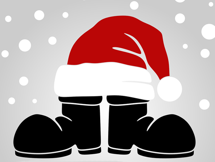 Czarne buty Świętego Mikołaja pod czerwonym czerwonym kapeluszem Mikołaja na szarym tle z padającym śniegiem.