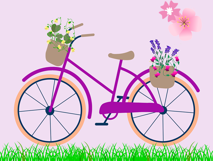 Rower z koszykami pełnych kwiatów na łące